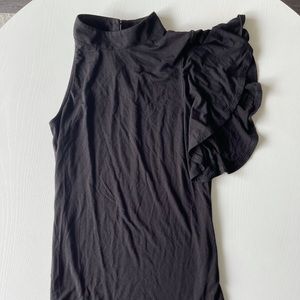 Black one sleeved top.